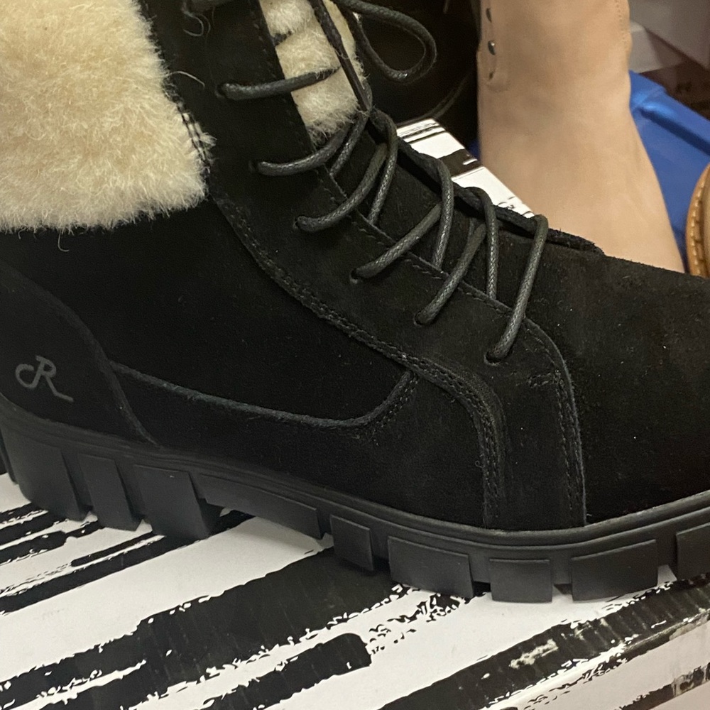 Black laced boots w/ blocked heel.